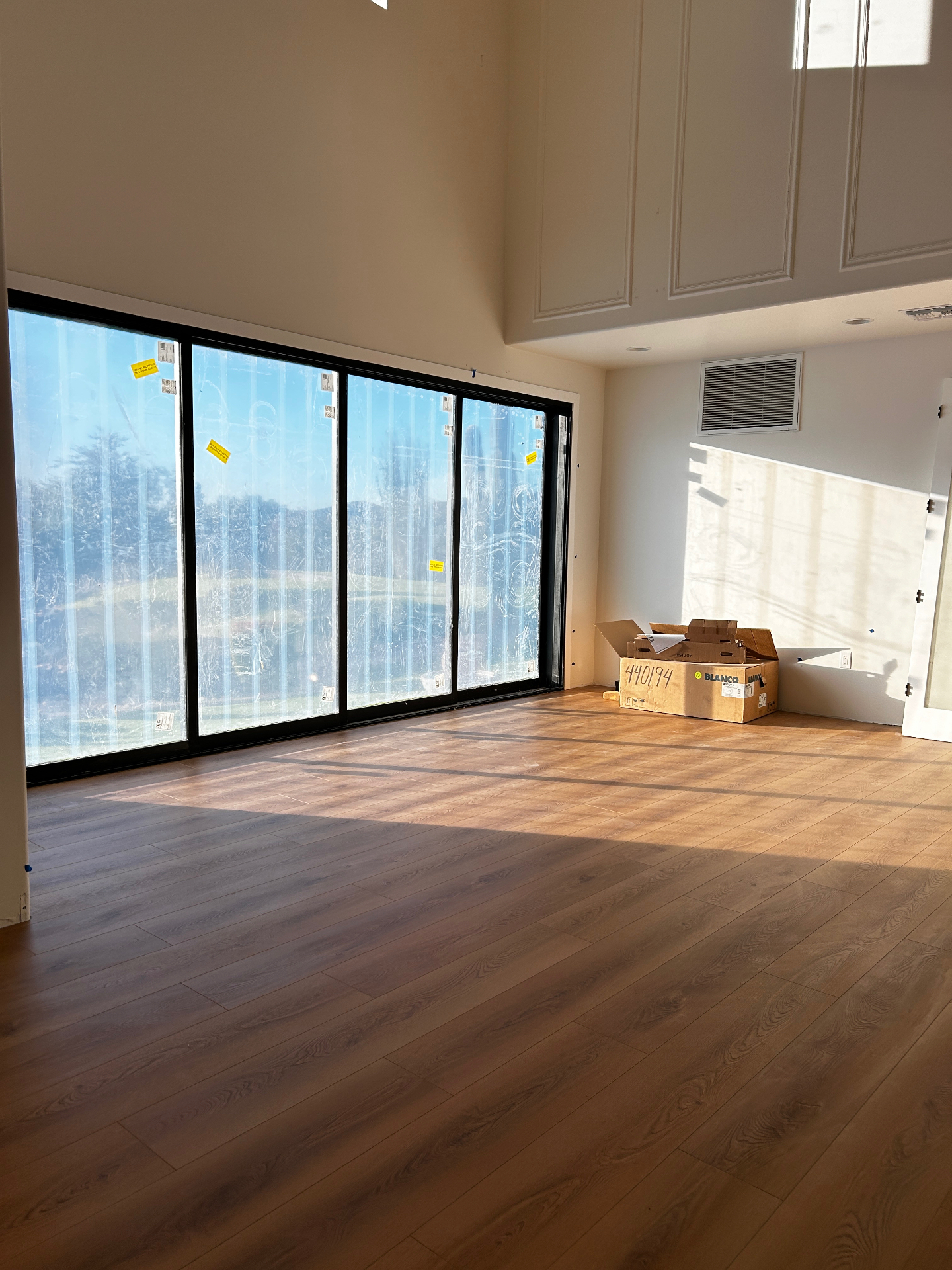 Wide-plank luxury vinyl flooring installed by HPM Flooring in an Arizona great room